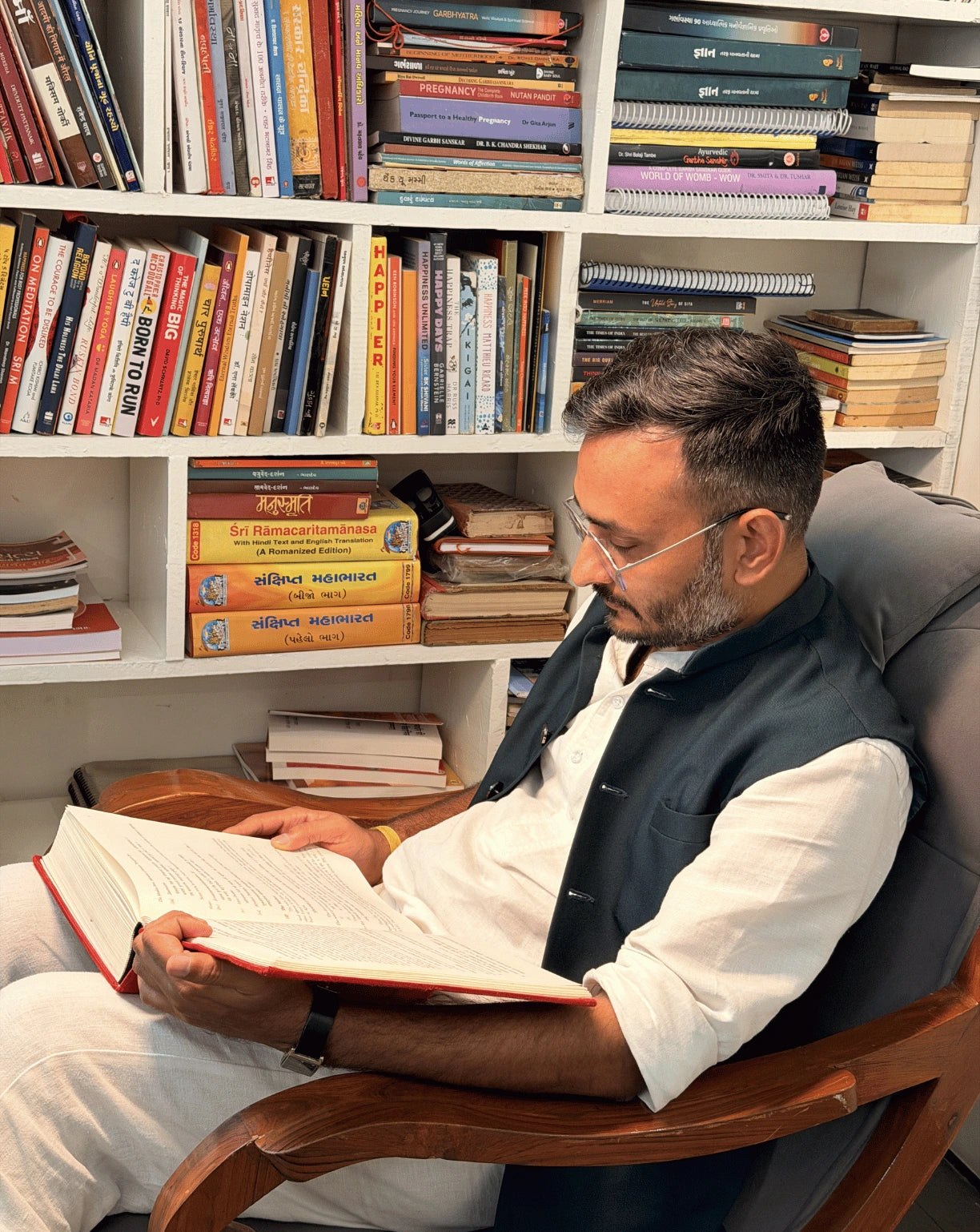 Ashish Bhalani studying scriptures
